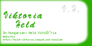 viktoria held business card